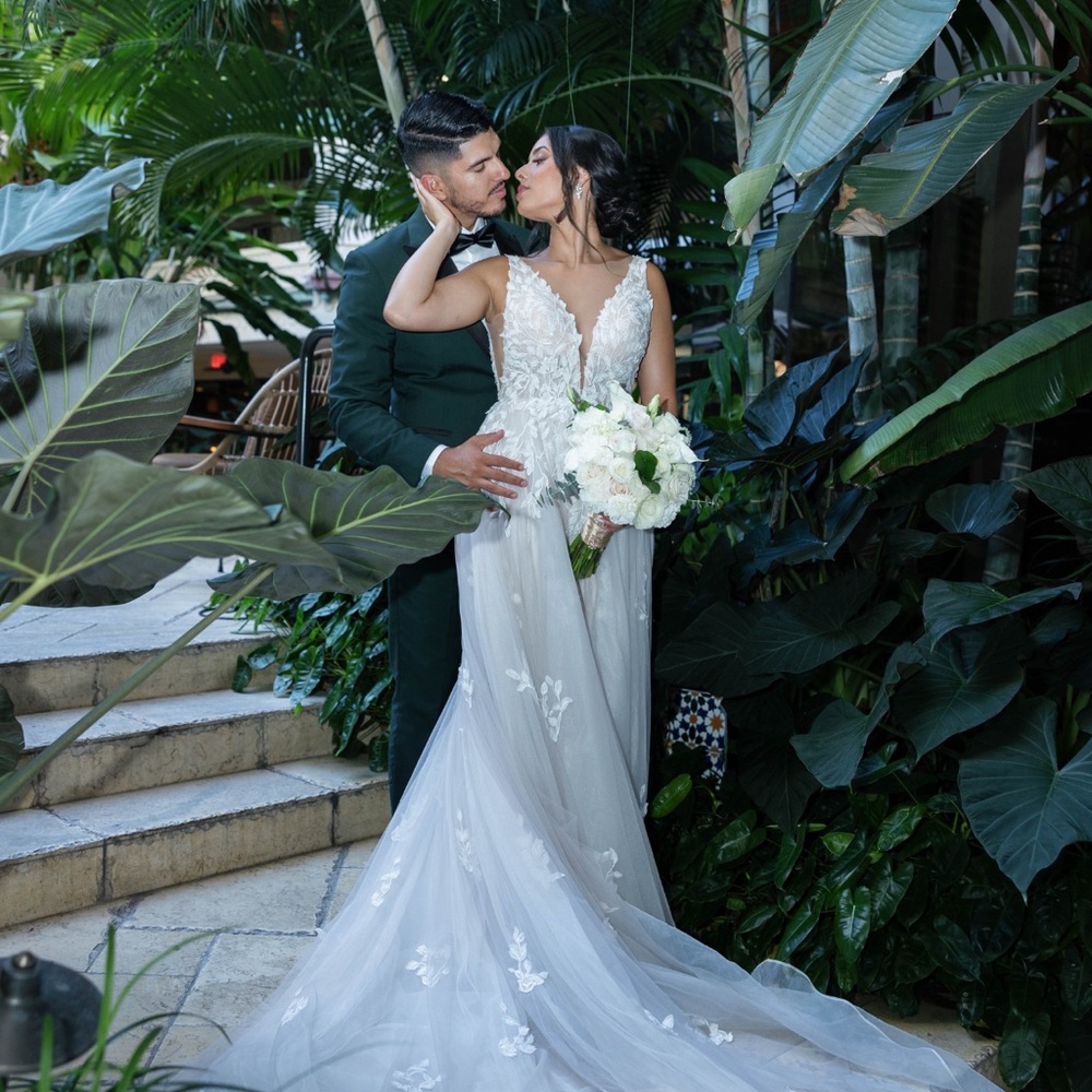 Elegant White Wedding Dress with Floral Details